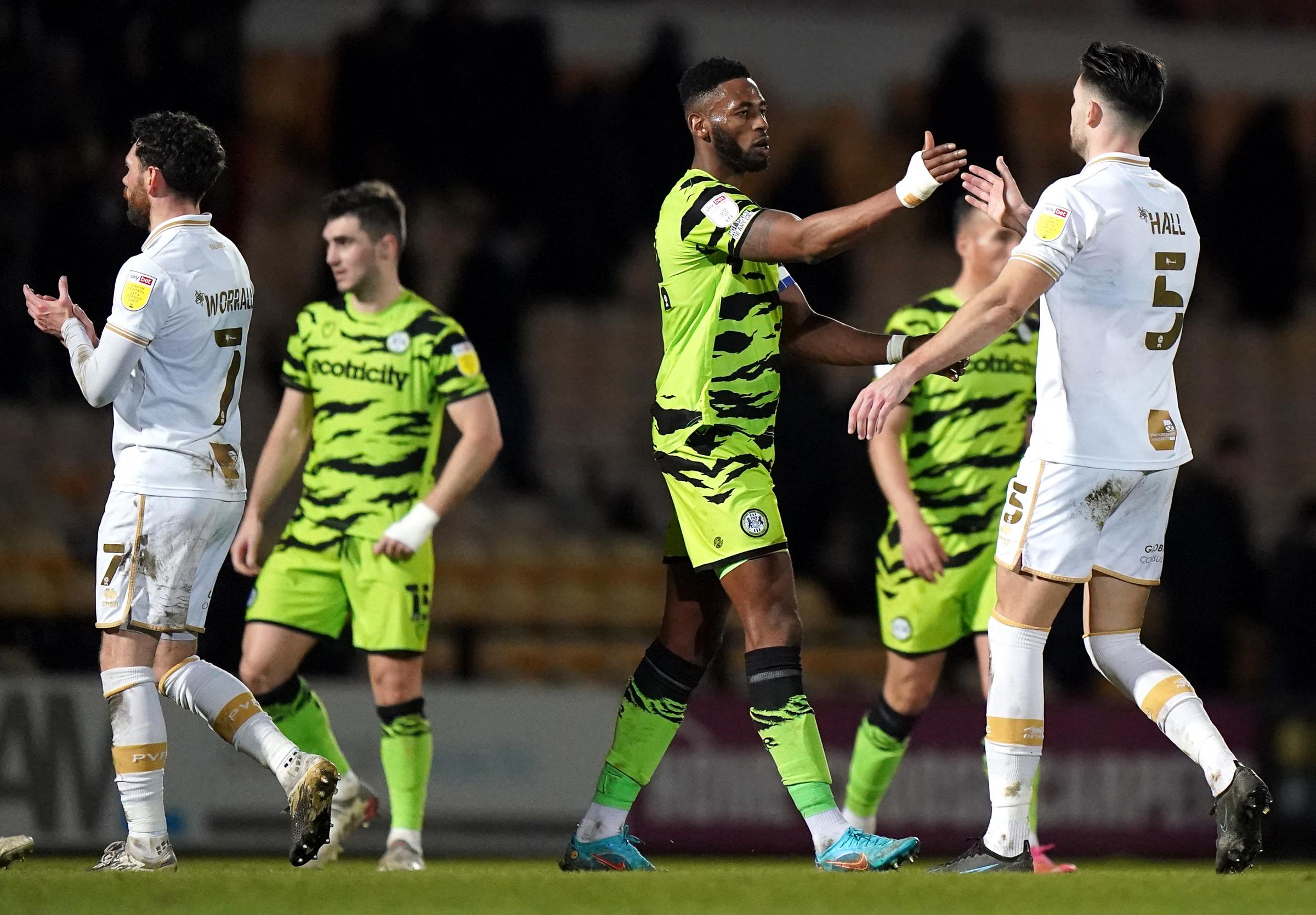 Port Vales Connor Hal (right) and Forest Green Rovers Jamille Matt shake hands after the final whistle during the Sky Bet League Two match at Vale Park, Stock-on-Trent. Picture date: Tuesday February 1, 2022.